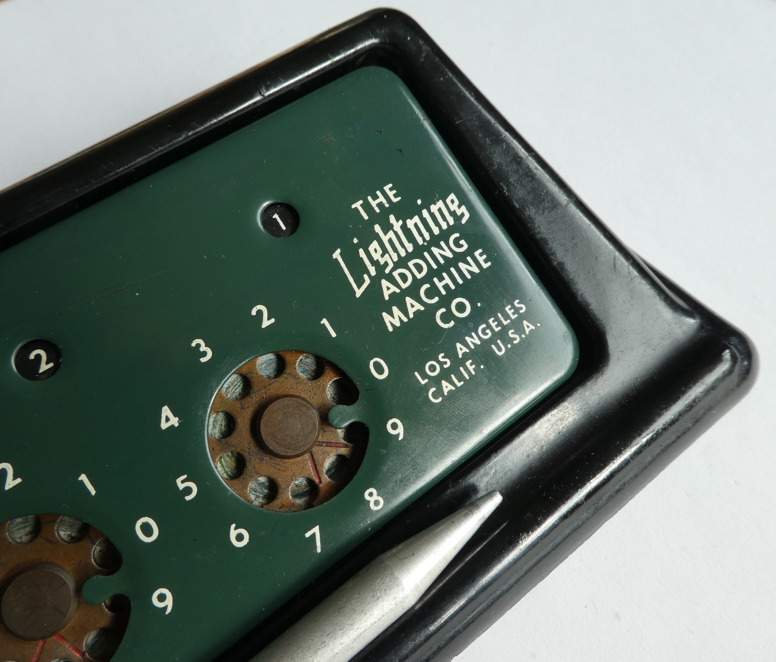 Figure 7 — The early Los Angeles nameplate: "THE Lightning ADDING MACHINE CO., LOS ANGELES CALIF. U.S.A.", on the green machine of February 1946.