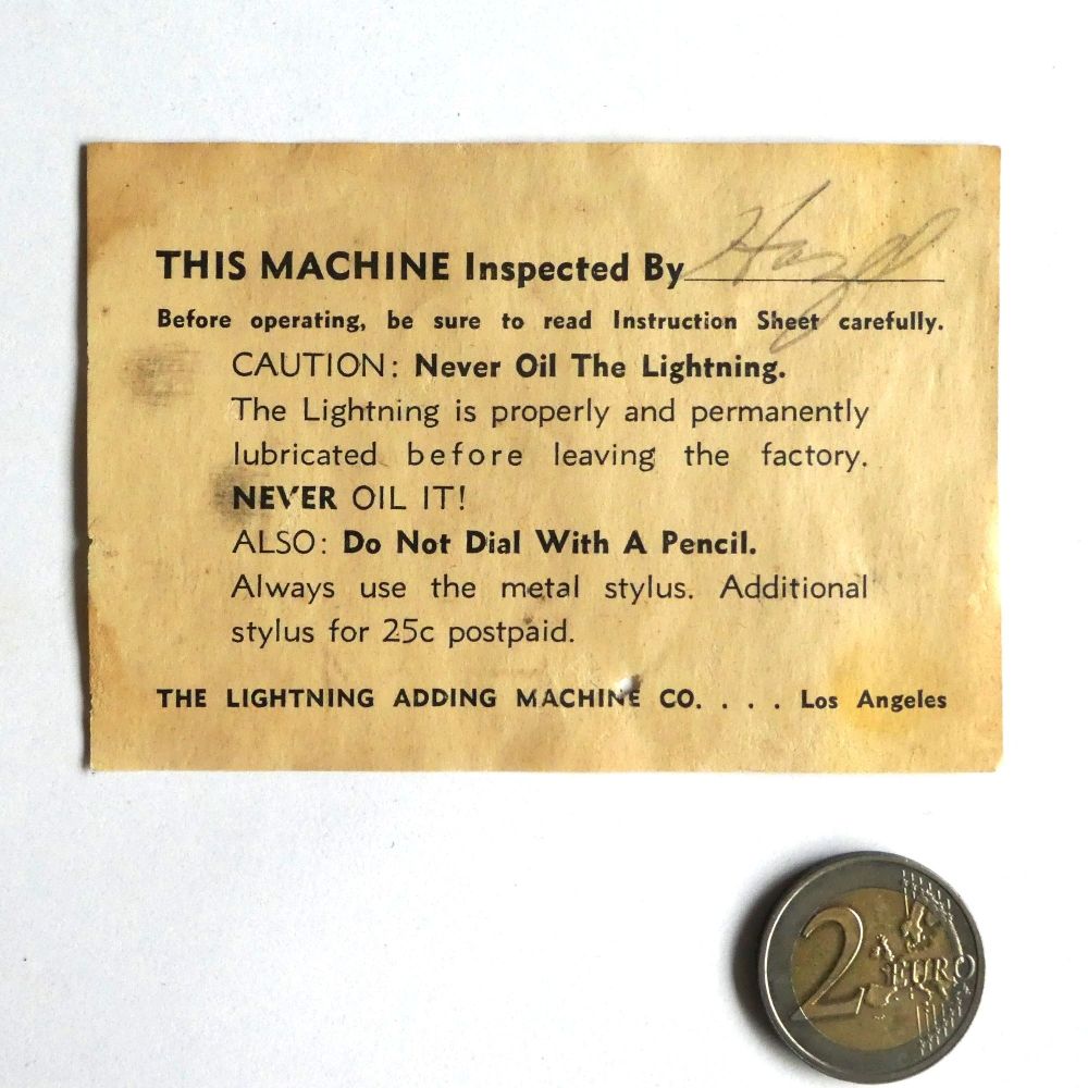 Figure 8 — The inspection card packed with Los Angeles machines: "CAUTION: Never Oil The Lightning… ALSO: Do Not Dial With A Pencil. Always use the metal stylus. Additional stylus for 25c postpaid."