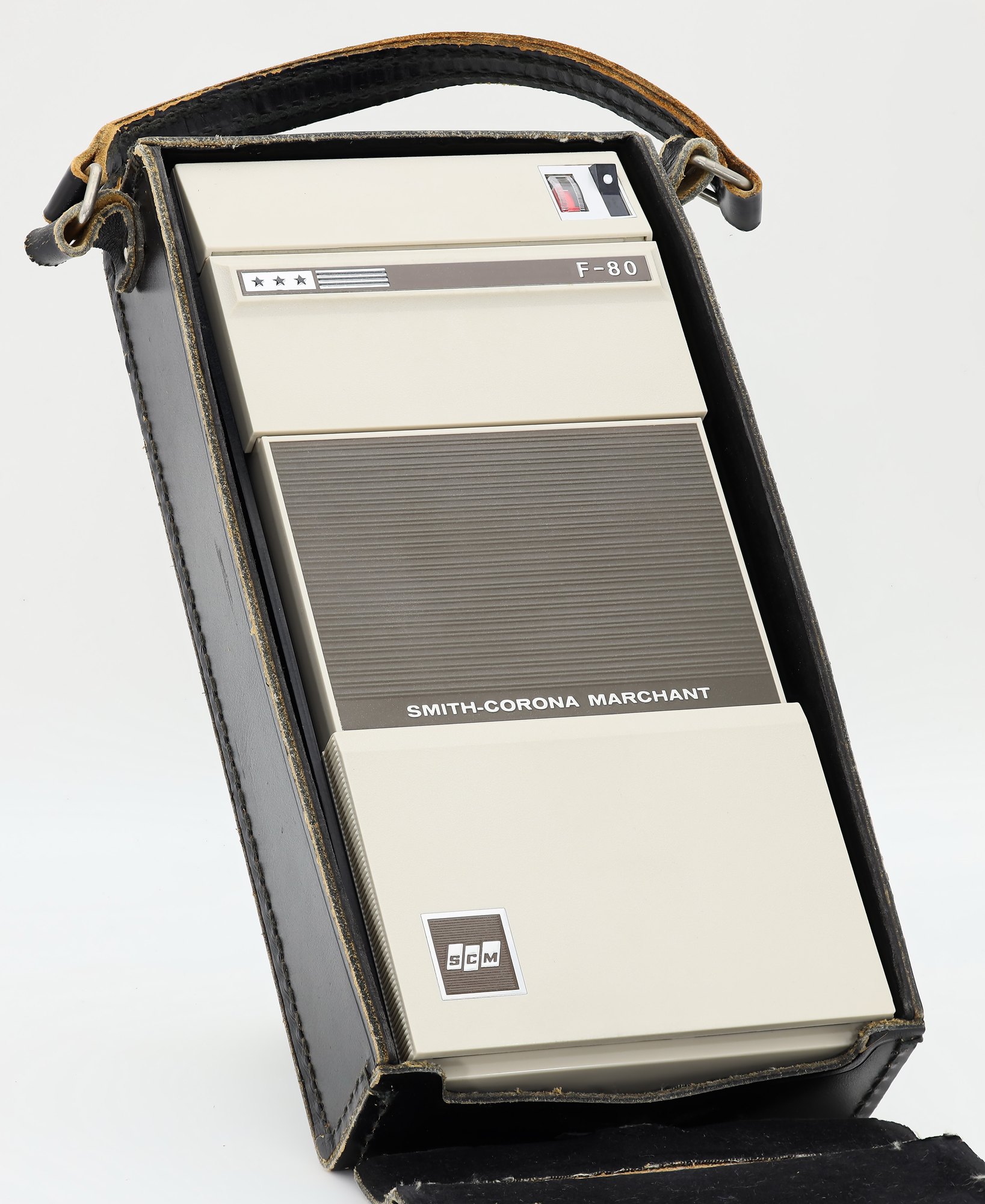 Figure 23 — An SCM Marchant F80 (Marchant I) of 1970 in its leather carrying case: a hand-held, battery-powered calculator with eight Nixie tubes.