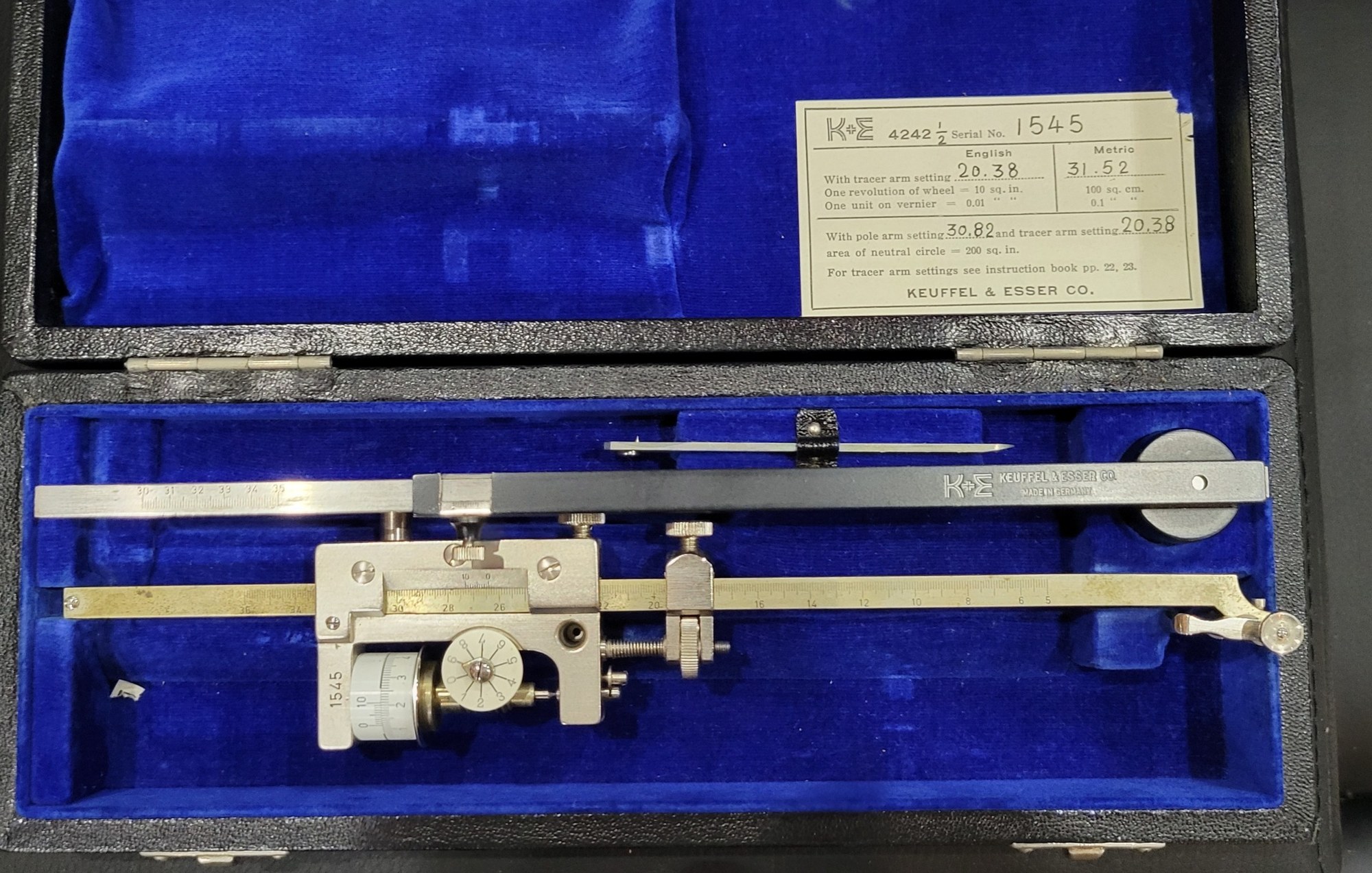 Figure 3 — The settings card in the lid of my planimeter: tracer arm 20.38 for square inches, 31.52 for square centimetres, and pole arm 30.82 for a neutral circle of 200 sq in.