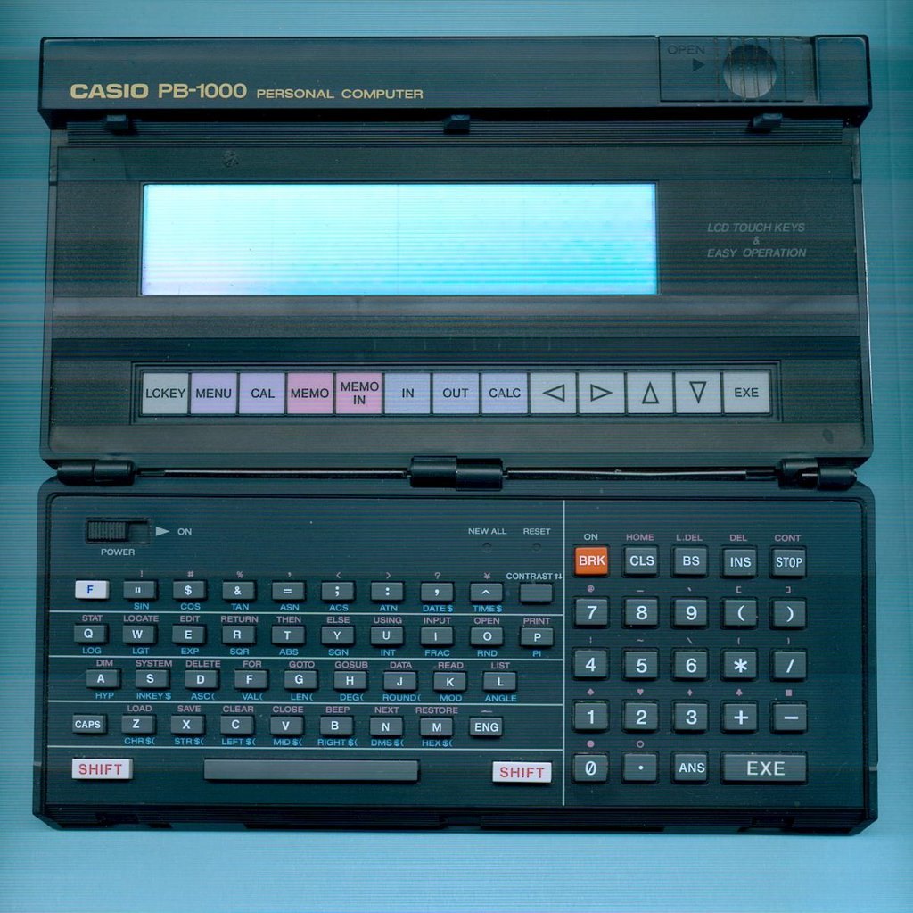 Figure 14 — The Casio PB-1000 of 1986, opened: a clamshell with a touch-sensitive display above the keyboard.
