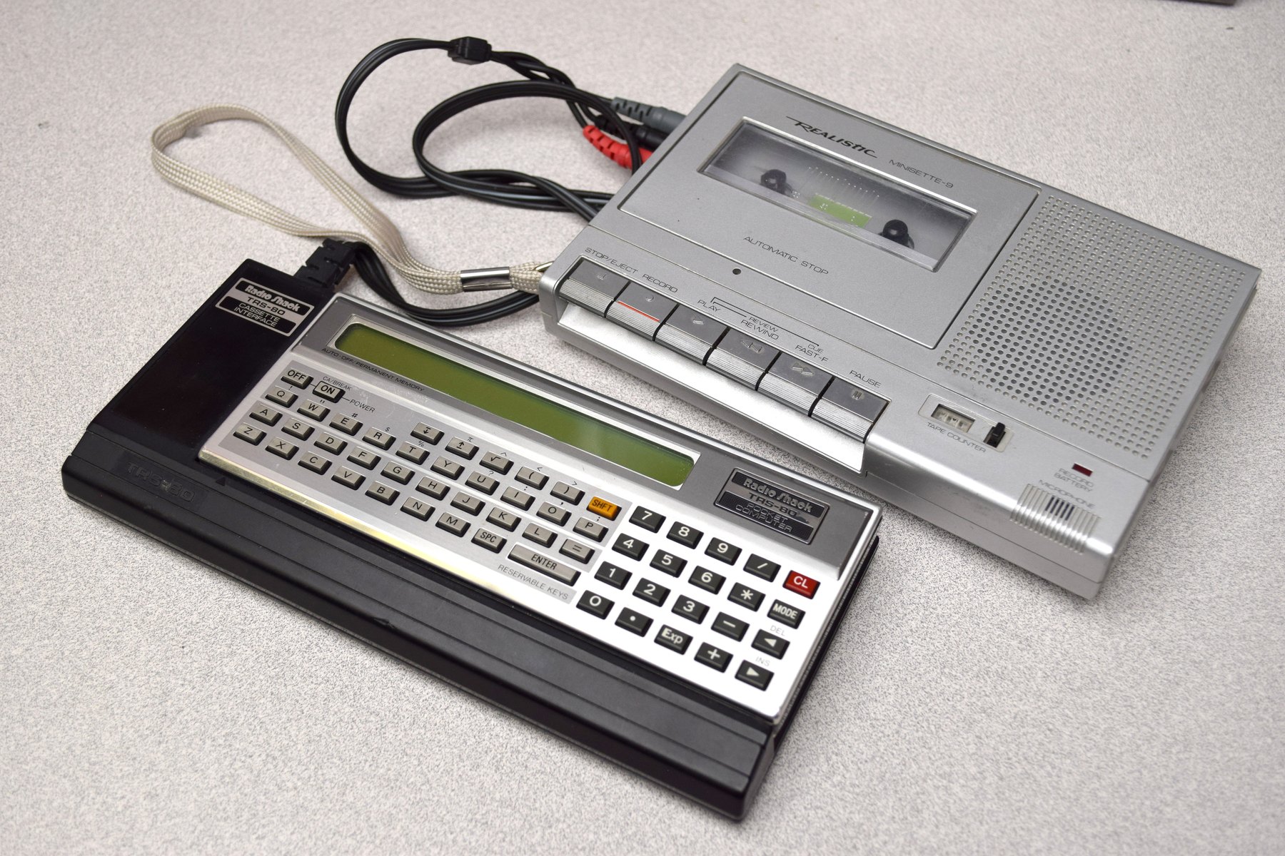 Figure 5 — A TRS-80 Pocket Computer with its Cassette Interface and a Radio Shack Minisette-9 recorder, the combination Radio Shack recommended.