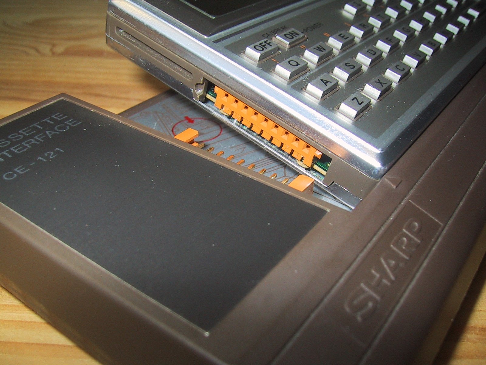 Figure 9 — Sharp's CE-122, the original of the 26-3505, with a PC-1211 docked.