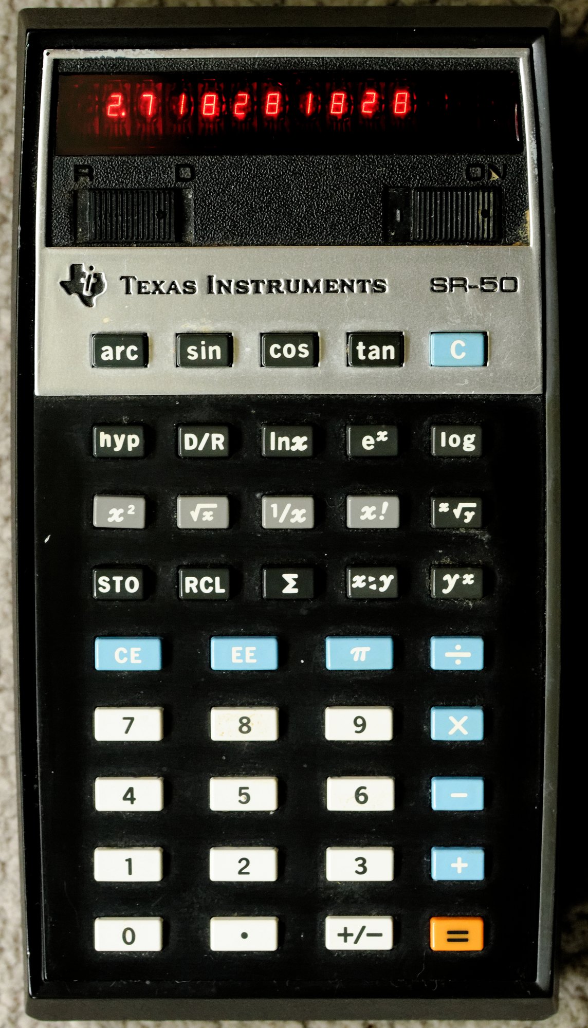 Figure 5 — The TI SR-50 of 1974 at $169.95, TI's answer to the HP-35, with algebraic entry and a red LED display.