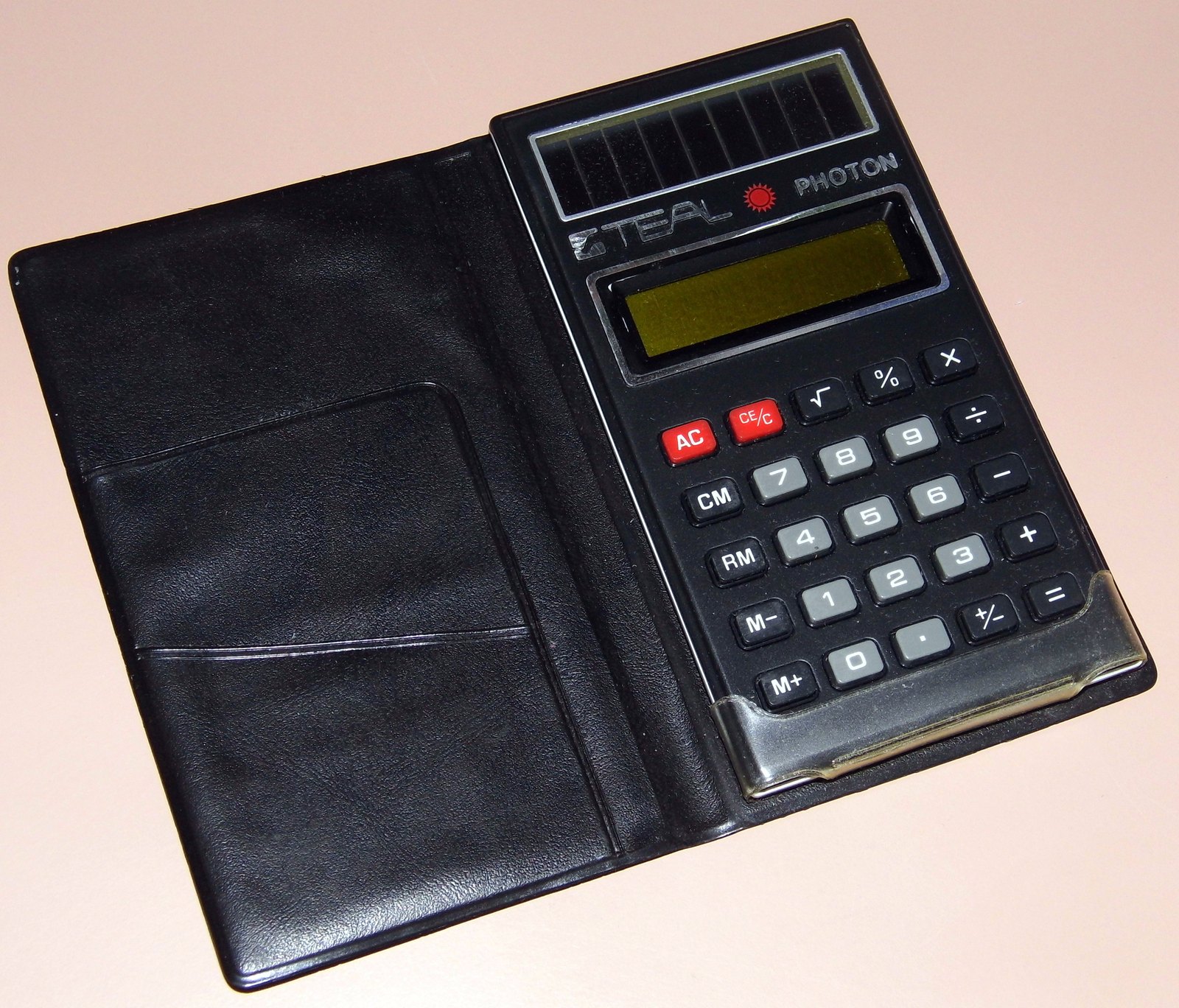 Figure 2 — The Teal Photon of about 1978, one of the first solar-powered calculators, with a yellow-filtered LCD.