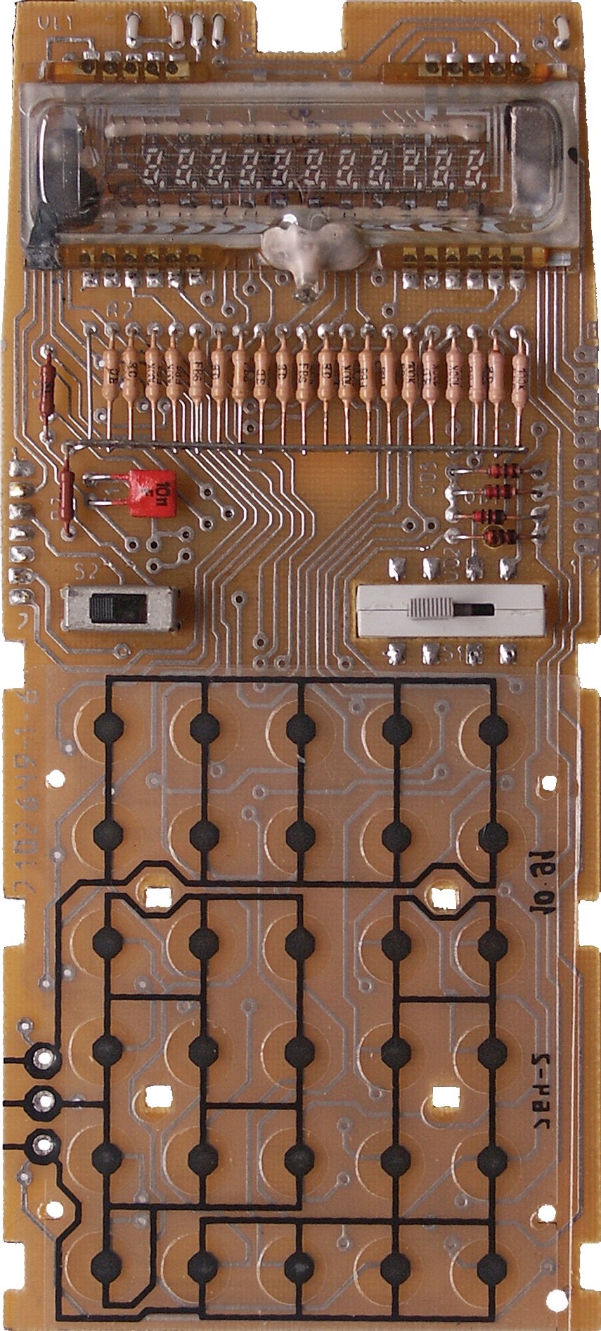 Figure 10 — The main board of an Elektronika MK-61: the ILC2-12/8L tube at the top, the chips under their protective blobs, and the keyboard contacts below.