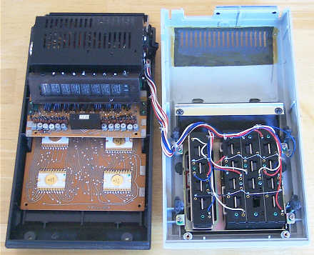 Figure 3 — The Sharp QT-8D opened: the display board with its row of Itron tubes at the top, and the logic board that carries the four Rockwell MOS chips below.